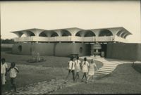 Last School building - children walking to school
